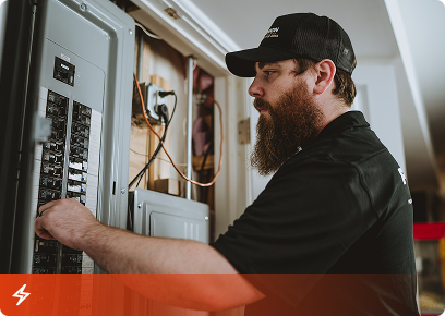 Precision-Electrical-CTA Precision Today electrician working inside a residential electrical panel