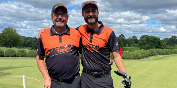 Precision Today team members golfing in a local charity golf outing to support the community